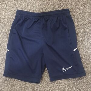 Nike Boys Navy Blue Athletic Shorts with White Swoosh